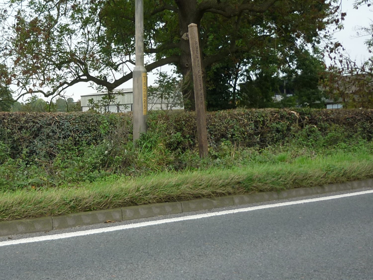 Photograph: October 2010: Ivy scraped off, sign now visible
